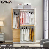 A white Butterfly Cupboard with Water Resistant Strong Laminated Board elements, featuring a closed door and multiple drawers, placed in a room with a potted plant to the side.